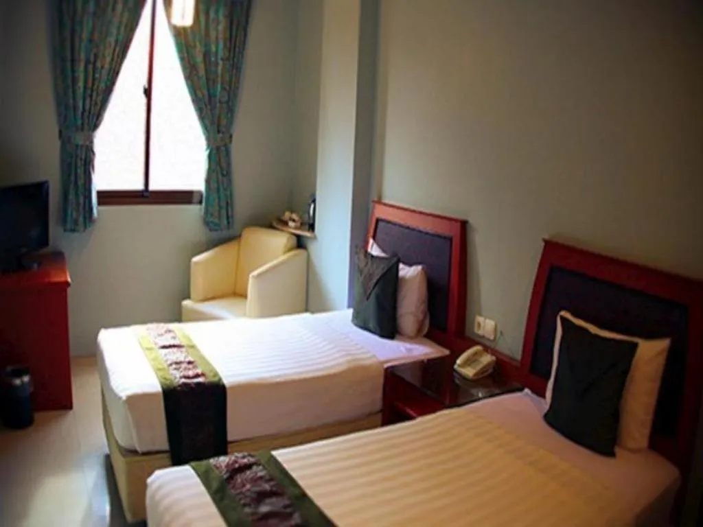 Bed in Rama Garden Hotel