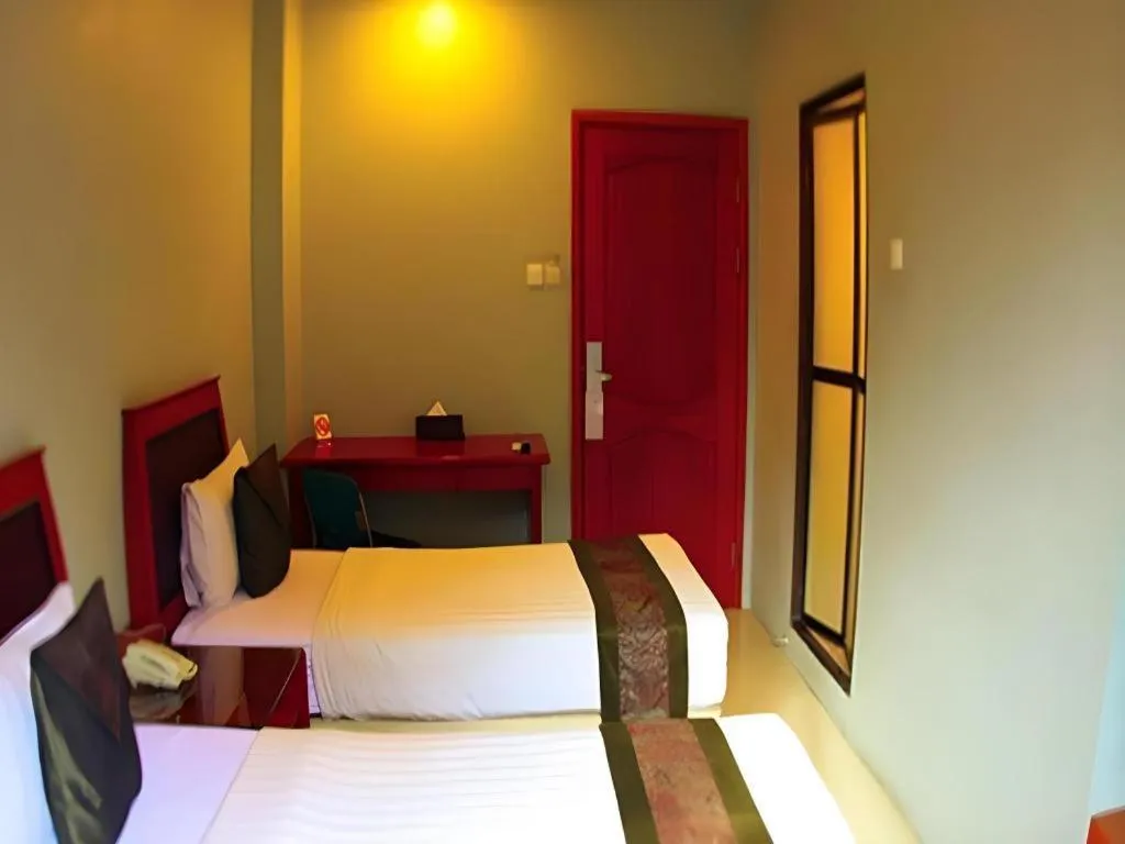 Bed in Rama Garden Hotel