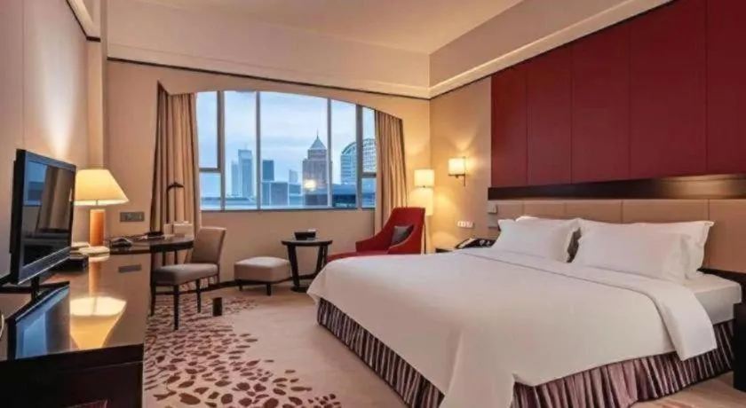 Bed in Shunde Emperor Hotel