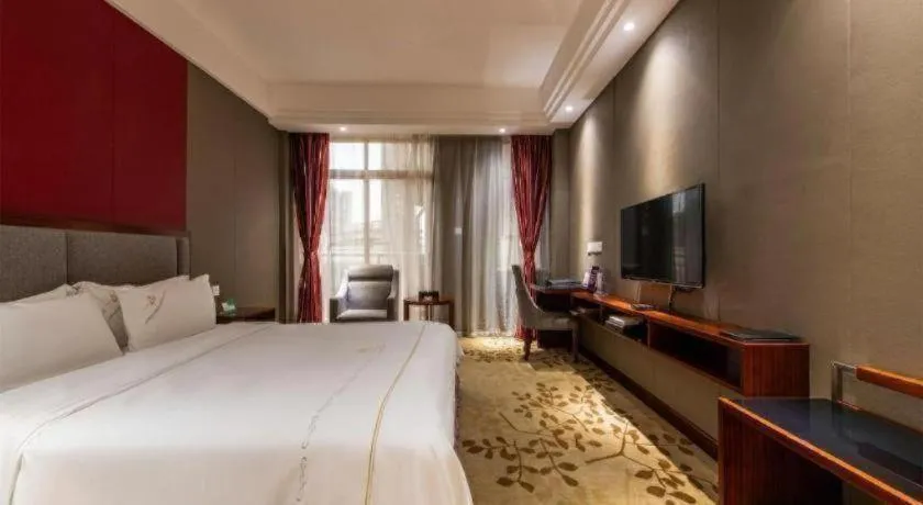 Bed in Shunde Emperor Hotel