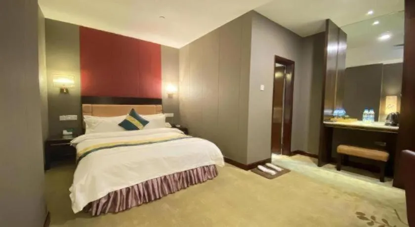 Bed in Shunde Emperor Hotel