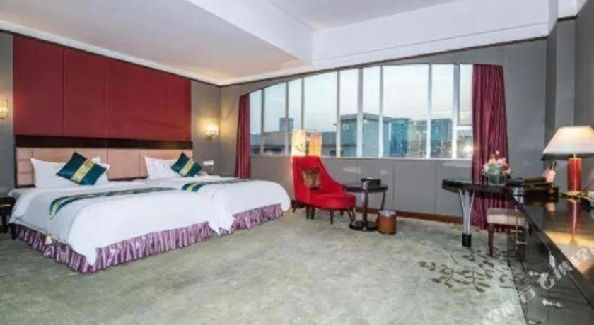 Bed in Shunde Emperor Hotel