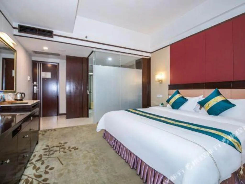 Bed in Shunde Emperor Hotel
