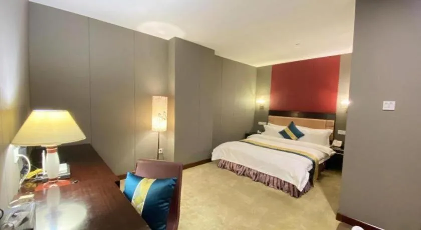 Bed in Shunde Emperor Hotel