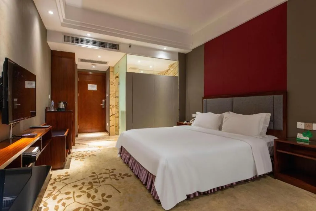 Bed in Shunde Emperor Hotel