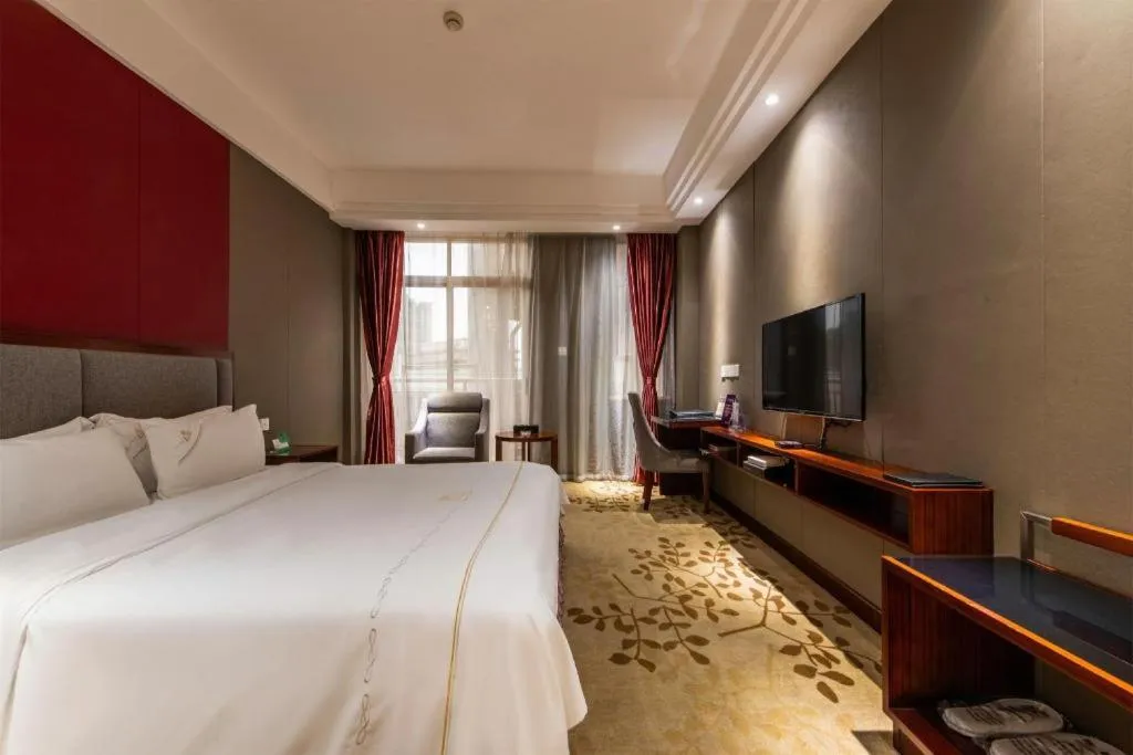 Bed in Shunde Emperor Hotel