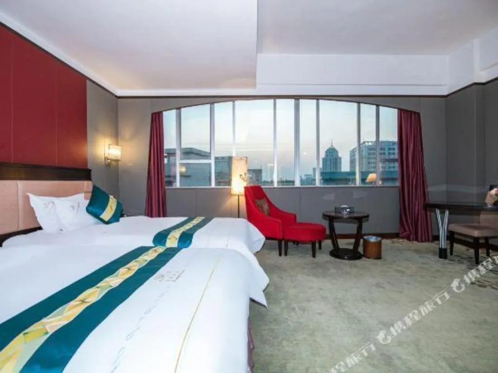 Bed in Shunde Emperor Hotel