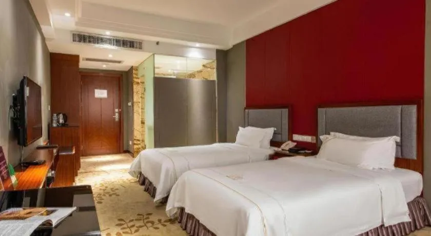 Bed in Shunde Emperor Hotel