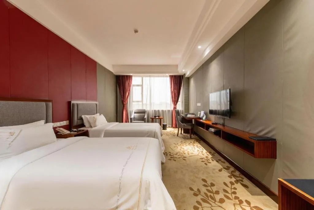 Bed in Shunde Emperor Hotel