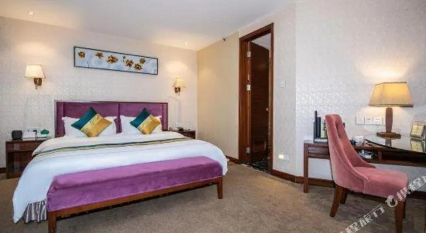 Bed in Shunde Emperor Hotel