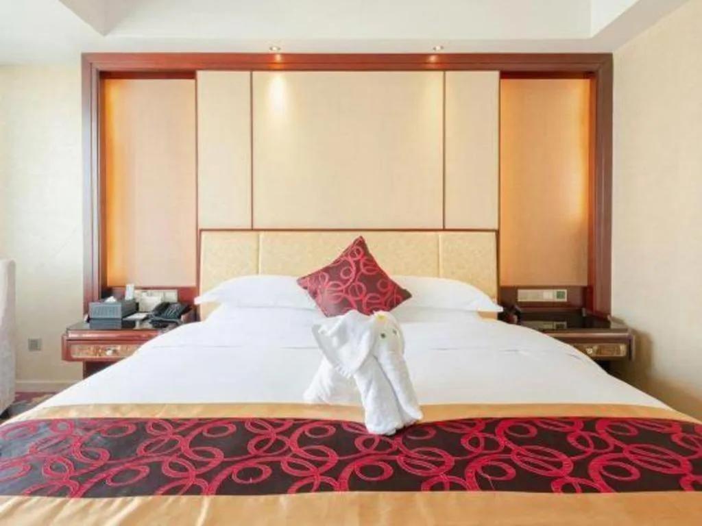Bed in Haikou Conifer Garden Hotel