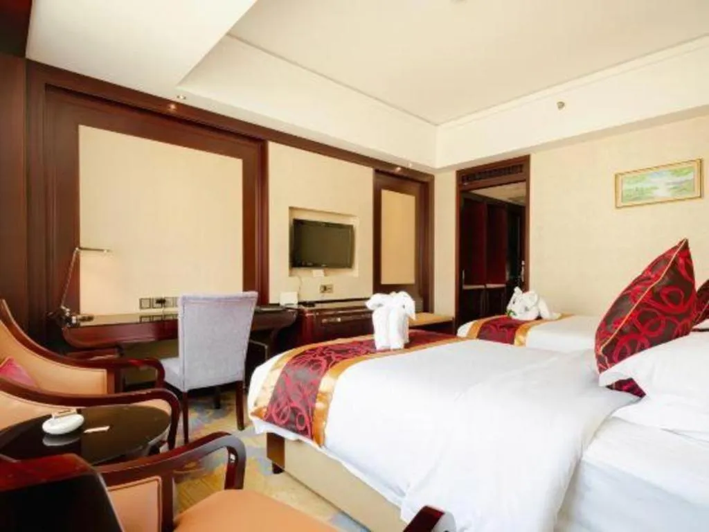 Bed in Haikou Conifer Garden Hotel