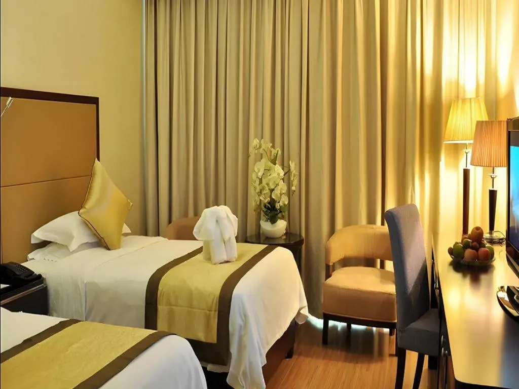 Bed in Haikou Conifer Garden Hotel