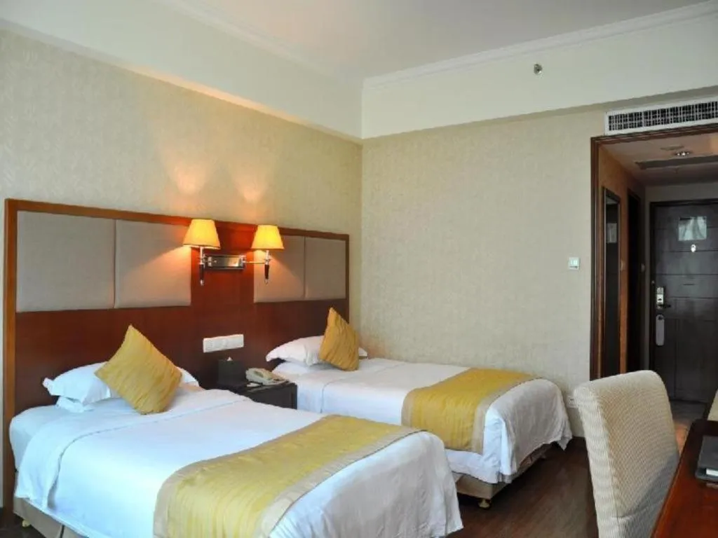 Bed in Haikou Conifer Garden Hotel