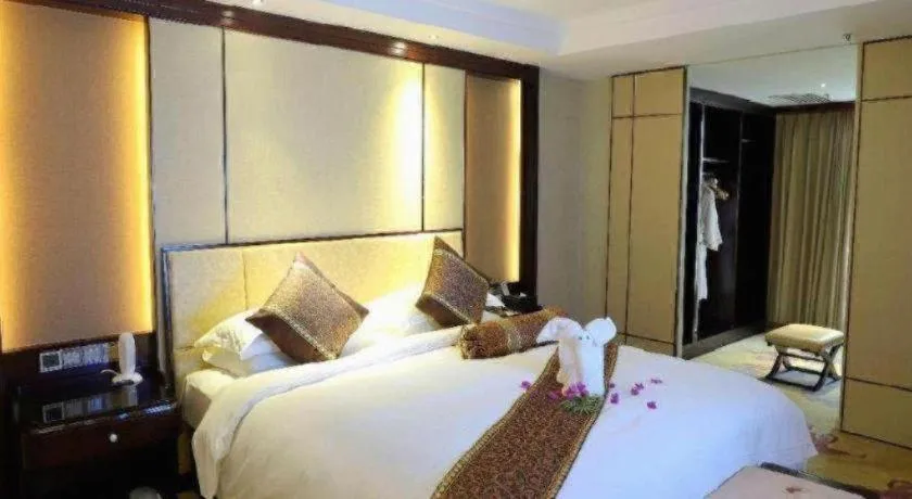 Bed in Haikou Conifer Garden Hotel