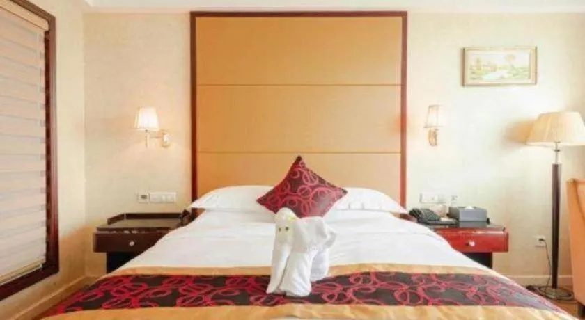Bed in Haikou Conifer Garden Hotel