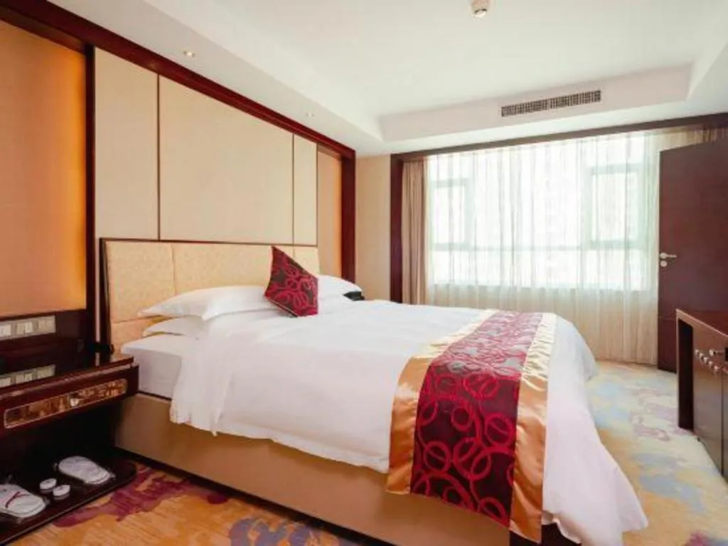 Bed in Haikou Conifer Garden Hotel