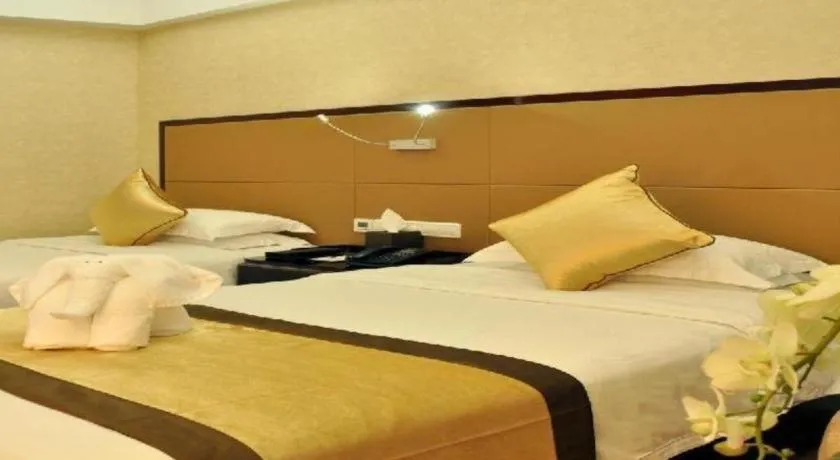 Bed in Haikou Conifer Garden Hotel