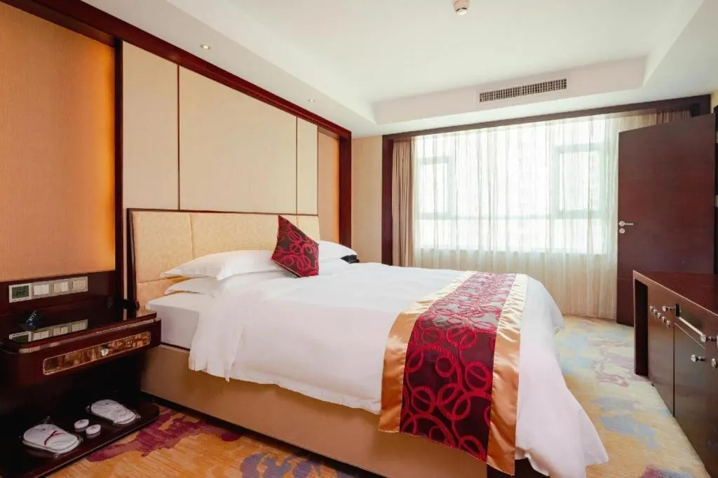 Bed in Haikou Conifer Garden Hotel