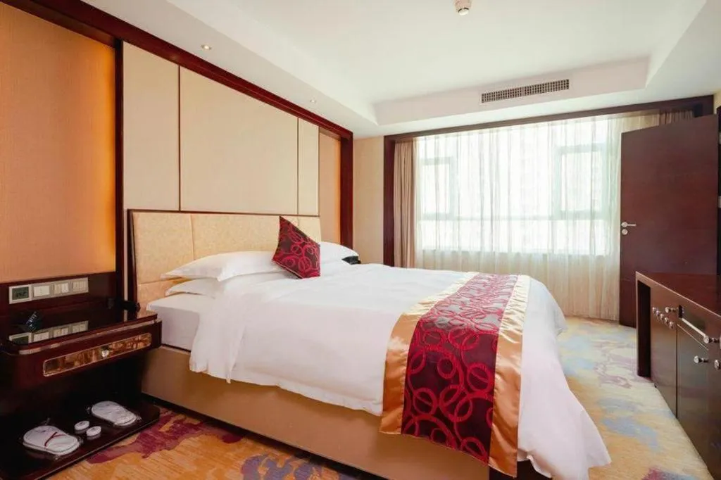 Bed in Haikou Conifer Garden Hotel