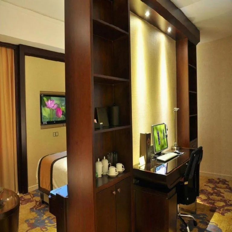 Bed in Haikou Conifer Garden Hotel