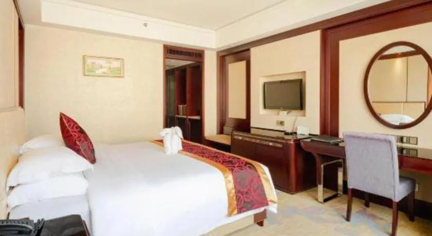 Bed in Haikou Conifer Garden Hotel