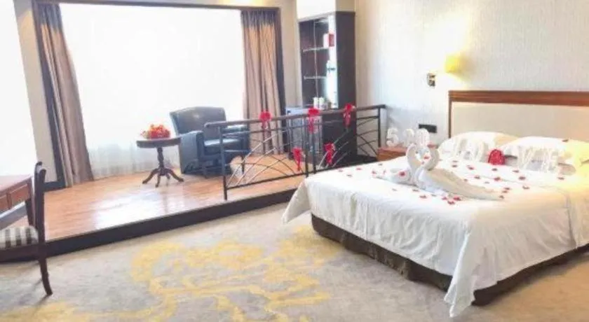 Bed in Fangzhong Holiday Hotel