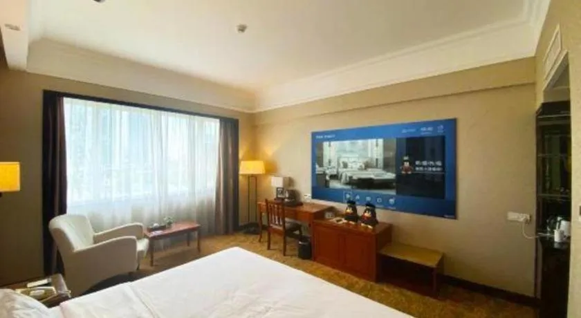 Bed in Fangzhong Holiday Hotel