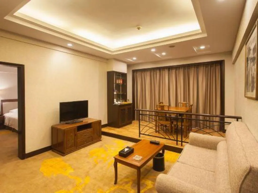 Bed in Fangzhong Holiday Hotel