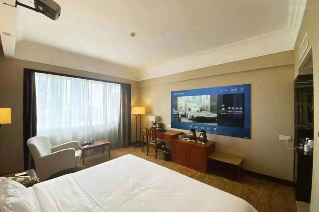 Bed in Fangzhong Holiday Hotel