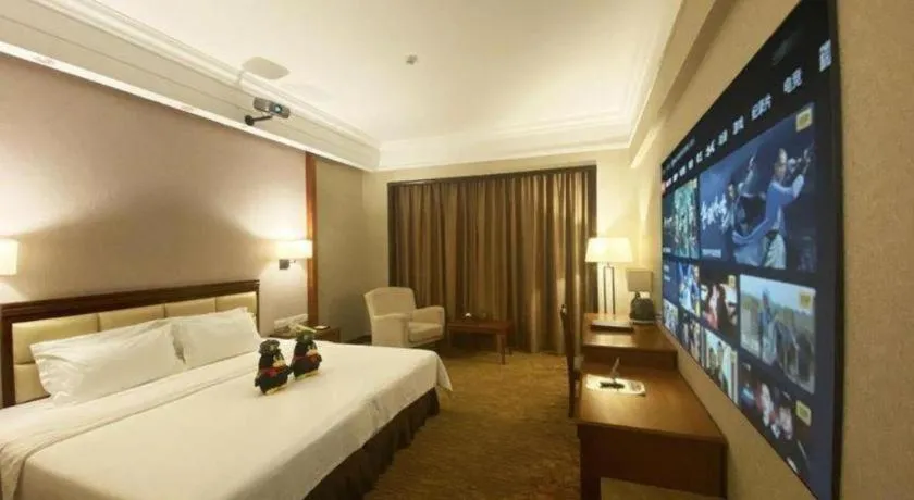 Bed in Fangzhong Holiday Hotel