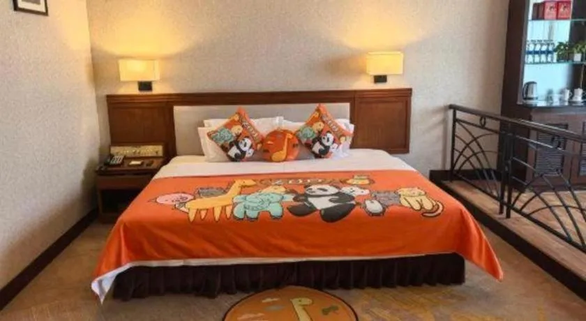 Bed in Fangzhong Holiday Hotel