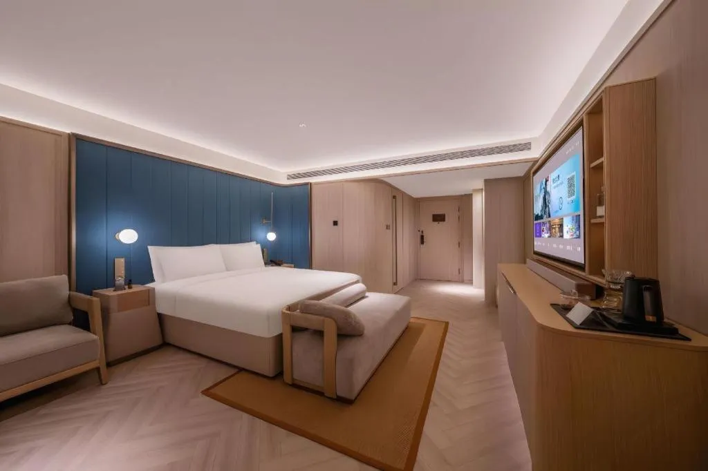 Bed in Lijia Hotel