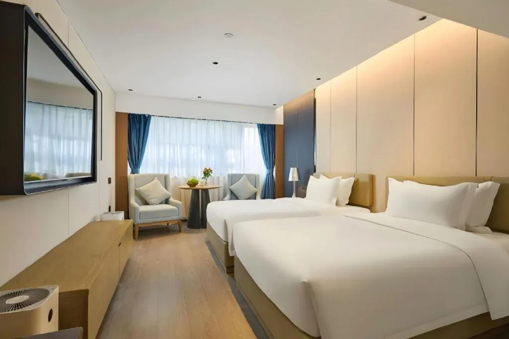 Bed in Lijia Hotel