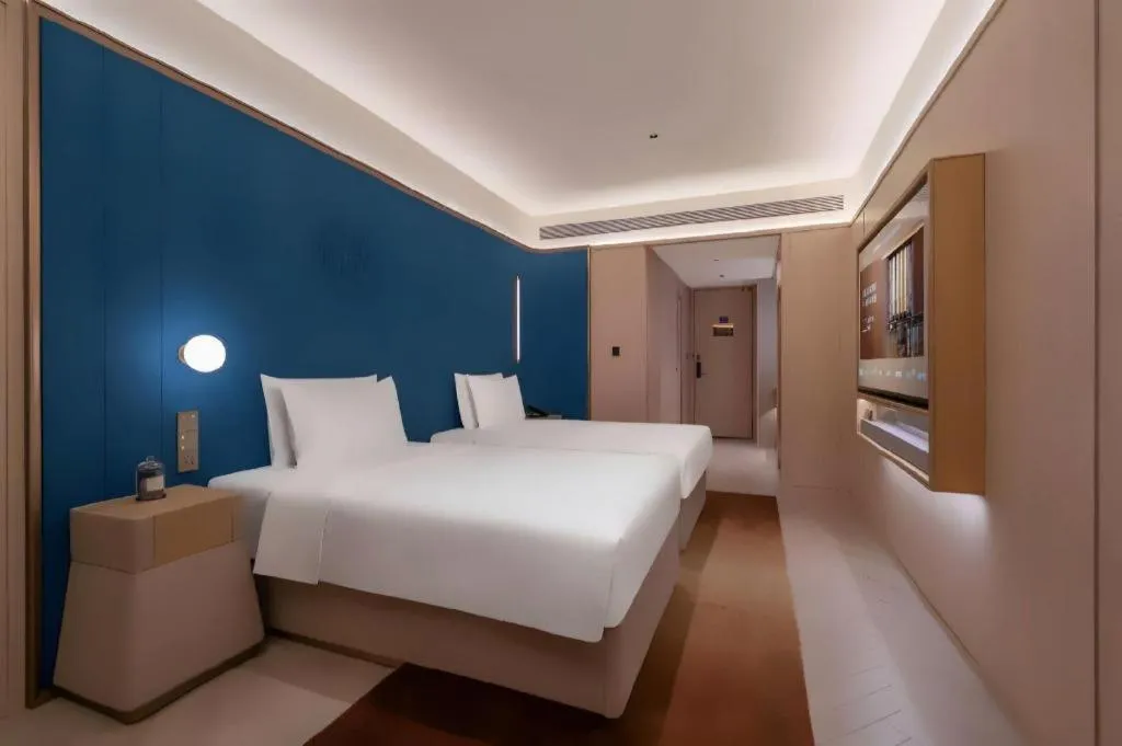 Bed in Lijia Hotel