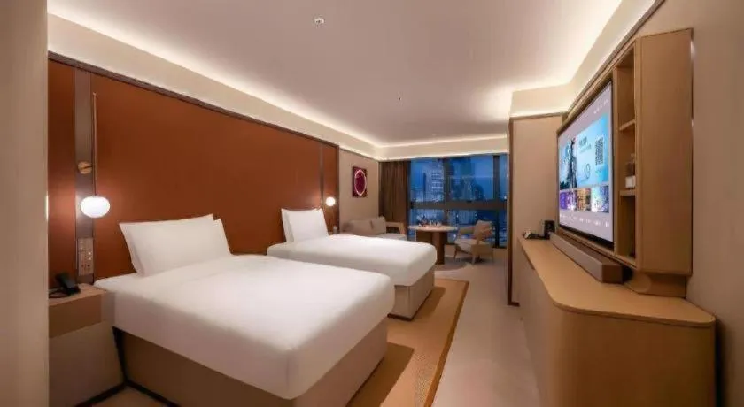Bed in Lijia Hotel