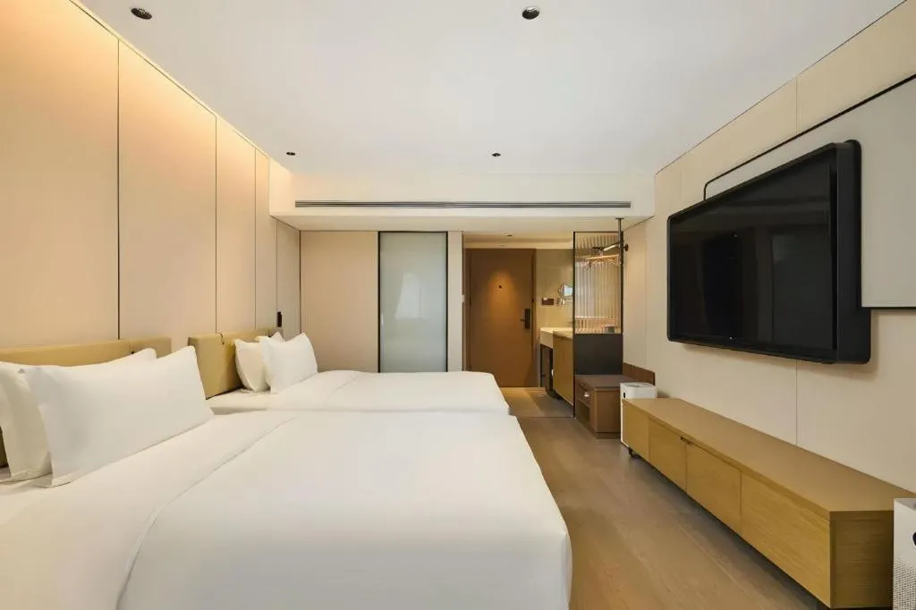 Bed in Lijia Hotel