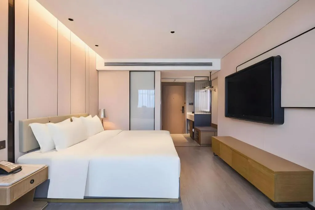 Bed in Lijia Hotel