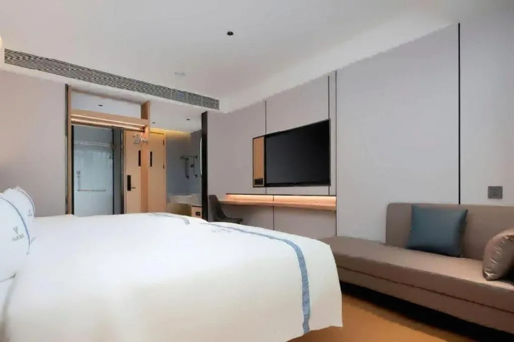 Bed in Lijia Hotel