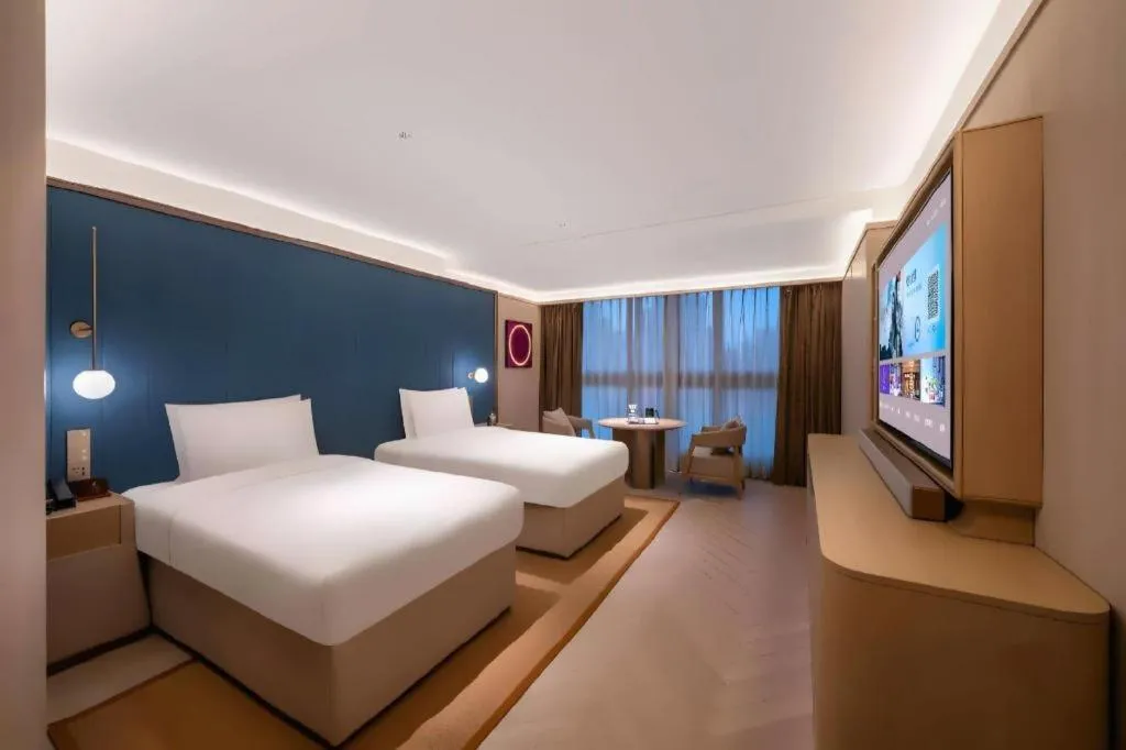 Bed in Lijia Hotel