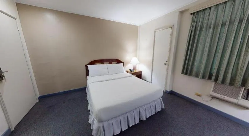 Bed in Adriatico Arms Hotel