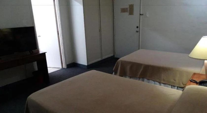 Bed in Adriatico Arms Hotel