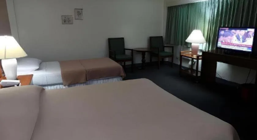 Bed in Adriatico Arms Hotel