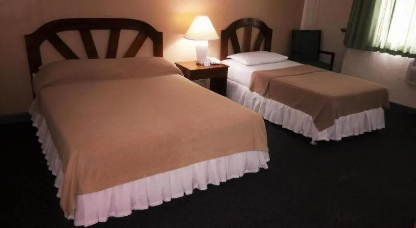 Bed in Adriatico Arms Hotel