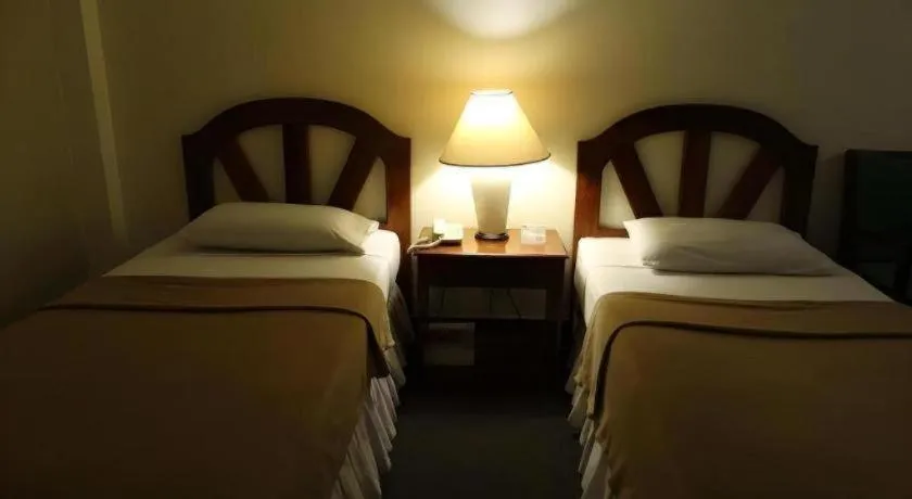 Bed in Adriatico Arms Hotel