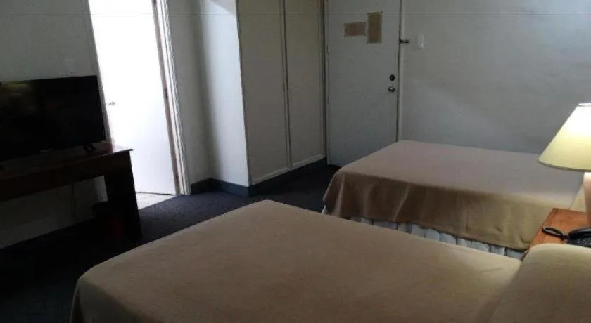 Bed in Adriatico Arms Hotel