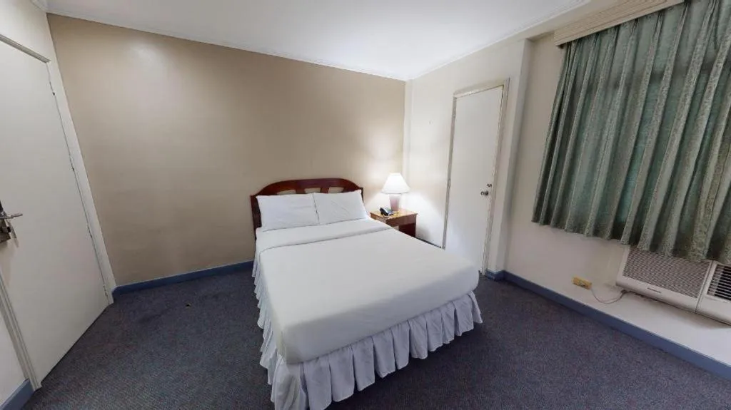 Bed in Adriatico Arms Hotel