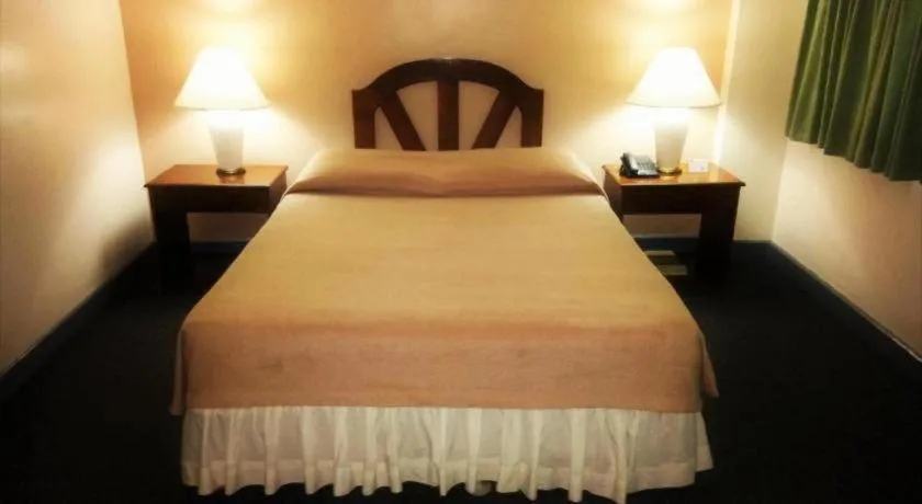 Bed in Adriatico Arms Hotel