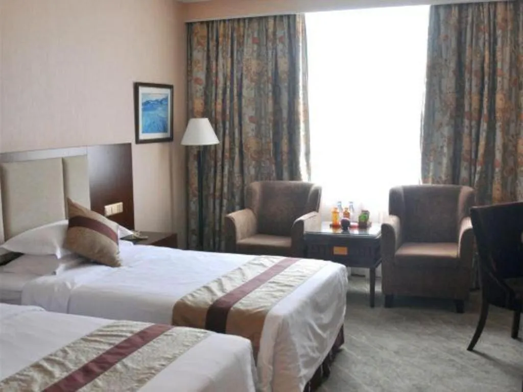 Bed in Chongqing Sunshine Continental Grand Hotel