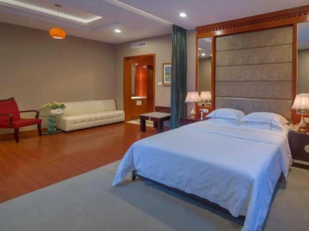 Bed in OSOTTO RECREATION HOTEL